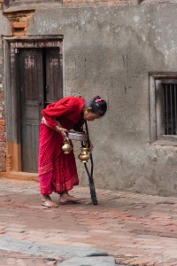 NE_0896: Nepal - Elderly carrying offers to the temple